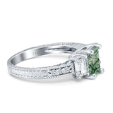 Three Stone Emerald Cut Gold Ring