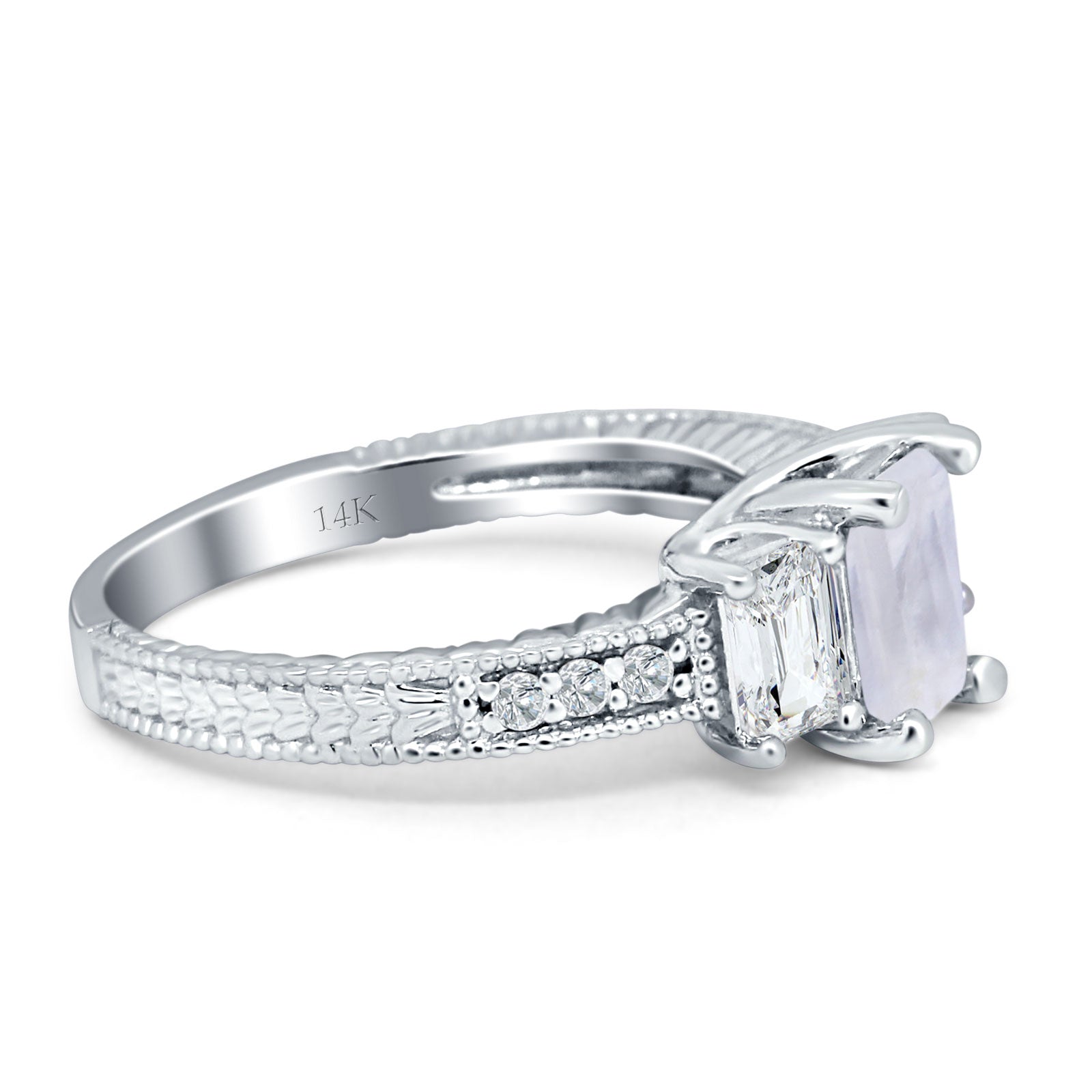 Three Stone Emerald Cut Gold Ring