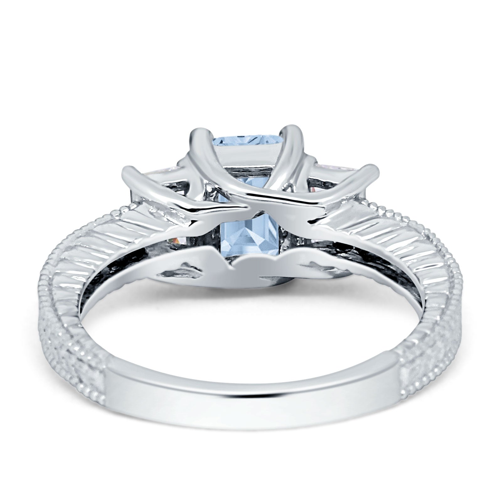 Three Stone Emerald Cut Gold Ring