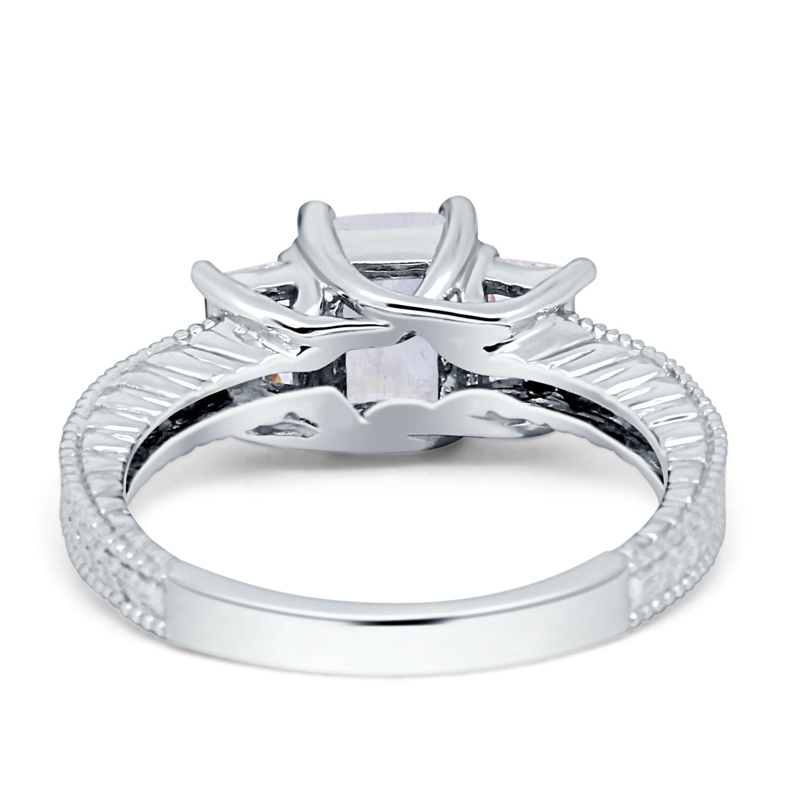 Three Stone Emerald Cut Gold Ring