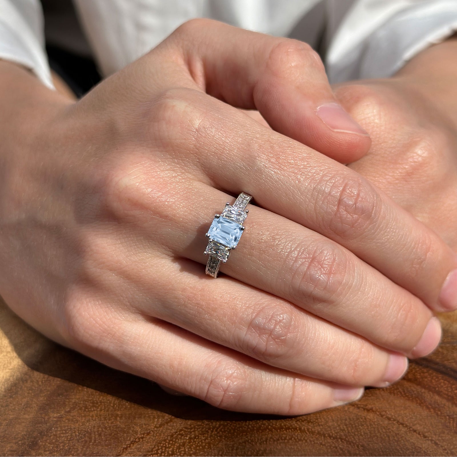 Three Stone Emerald Cut Gold Ring