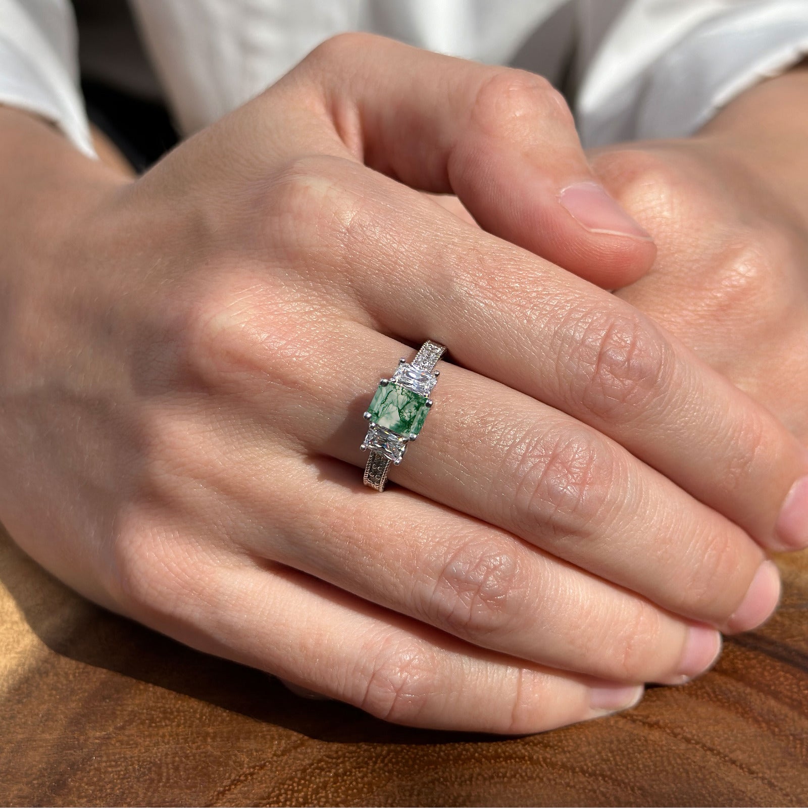Three Stone Emerald Cut Gold Ring