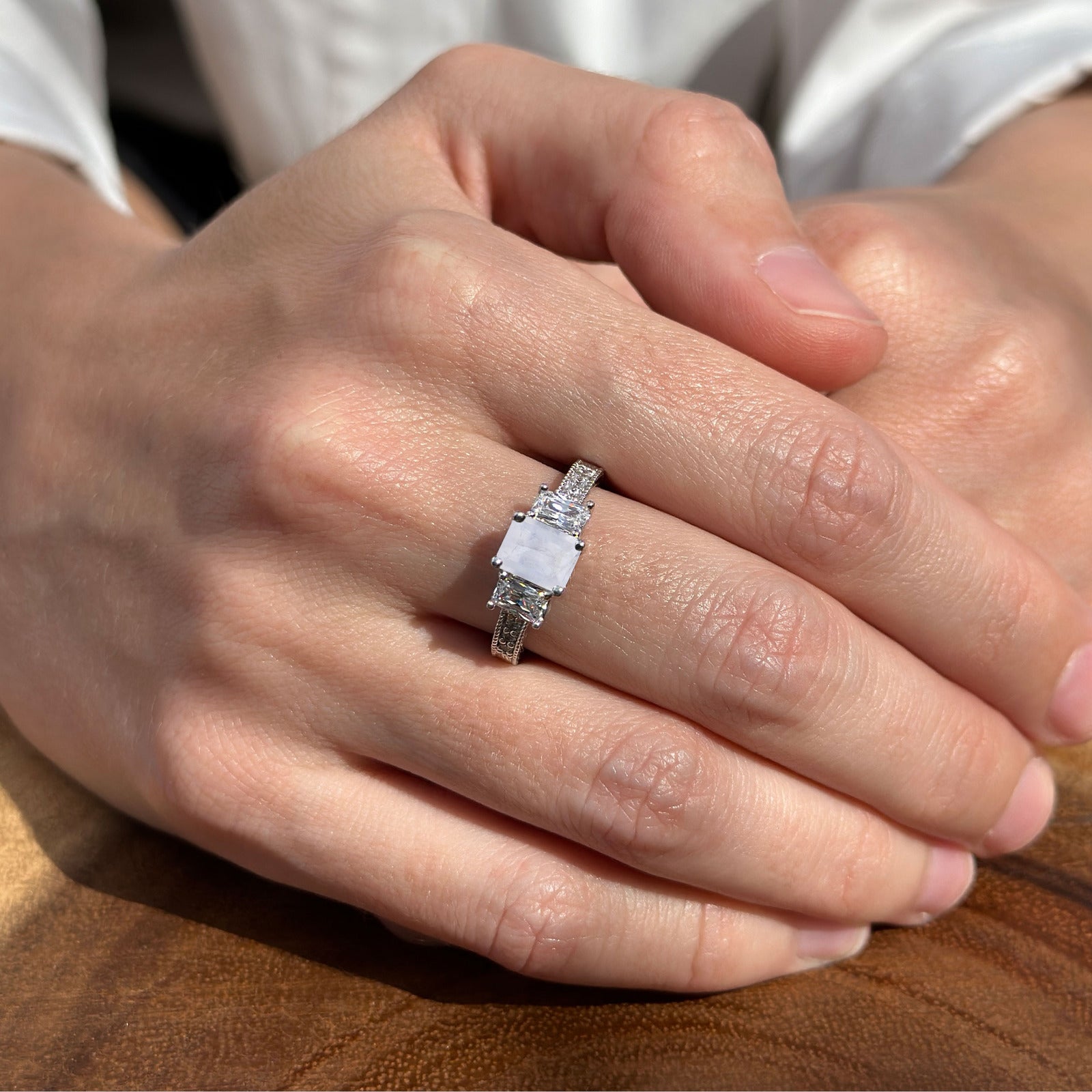 Three Stone Emerald Cut Gold Ring