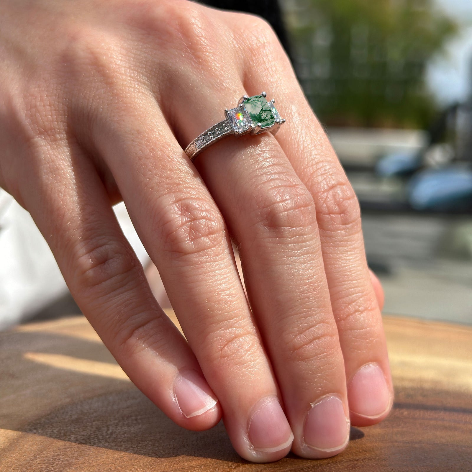 Three Stone Emerald Cut Gold Ring