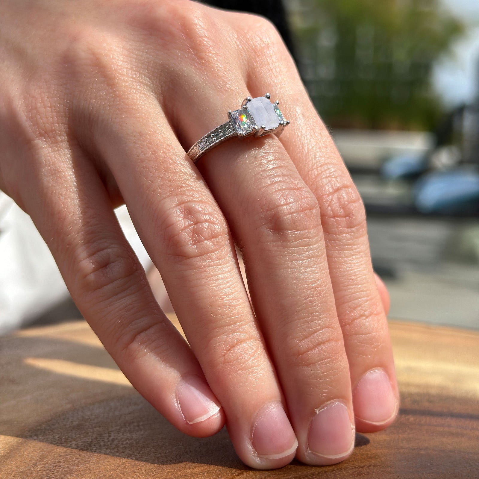 Three Stone Emerald Cut Gold Ring