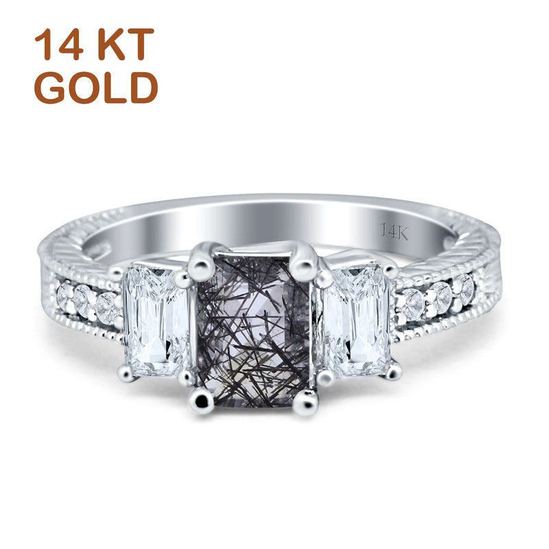 Three Stone Emerald Cut Gold Ring