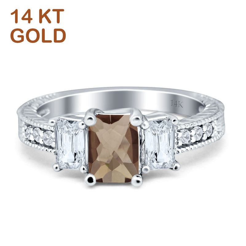 Three Stone Emerald Cut Gold Ring