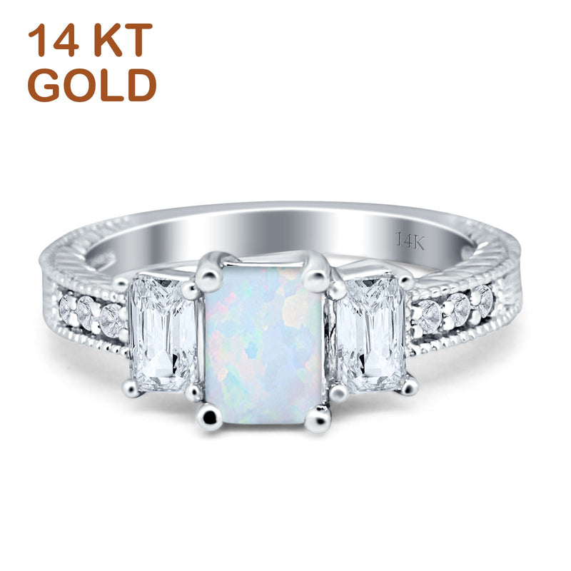 Three Stone Round & Emerald Cut CZ Gold Ring