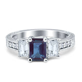 Three Stone Emerald Cut Gold Ring