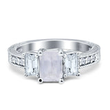Three Stone Emerald Cut Gold Ring