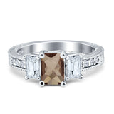 Three Stone Emerald Cut Gold Ring