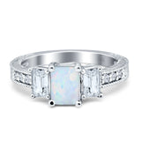 Three Stone Round & Emerald Cut CZ Gold Ring
