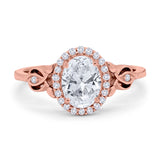Oval Halo Split Shank Twisted Ring
