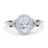 Oval Halo Split Shank Twisted Ring