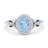 Oval Halo Split Shank Twisted Ring