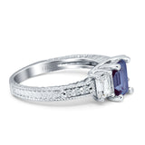 Three Stone Emerald Cut Gold Ring