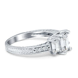 Three Stone Emerald Cut Gold Ring