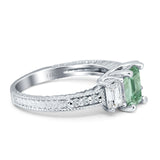 Three Stone Emerald Cut Gold Ring