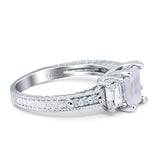 Three Stone Emerald Cut Gold Ring