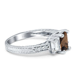 Three Stone Emerald Cut Gold Ring