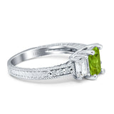 Three Stone Round & Emerald Cut CZ Gold Ring
