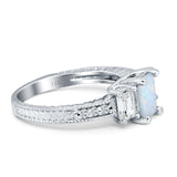 Three Stone Round & Emerald Cut CZ Gold Ring