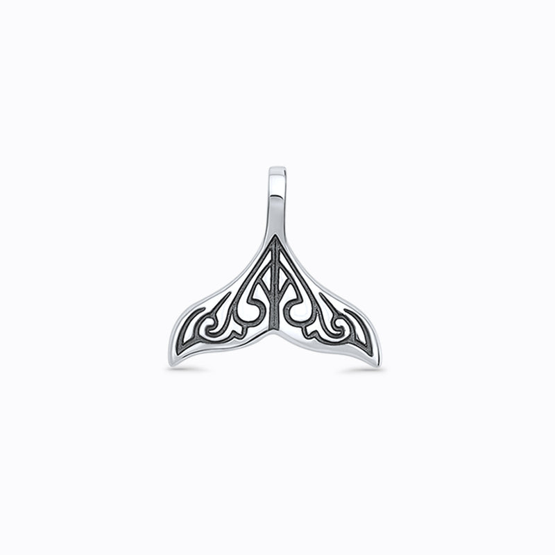 Close up of the oxidized vintage finish on the silver whale tail charm