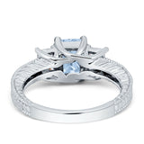 Three Stone Emerald Cut Gold Ring