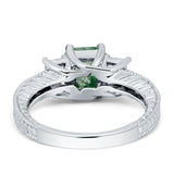 Three Stone Emerald Cut Gold Ring