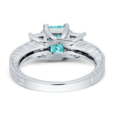 Three Stone Round & Emerald Cut CZ Gold Ring