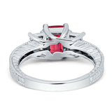 Three Stone Round & Emerald Cut CZ Gold Ring