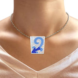 Blue CZ Scroll Design Pendant 