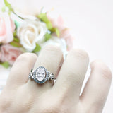 Oval Halo Split Shank Twisted Ring