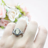 Oval Halo Split Shank Twisted Ring