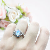 Oval Halo Split Shank Twisted Ring