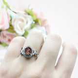 Oval Halo Split Shank Twisted Ring