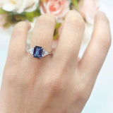 Three Stone Emerald Cut Trellis Ring