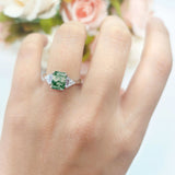 Three Stone Emerald Cut Trellis Ring