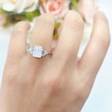 Three Stone Emerald Cut Trellis Ring