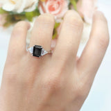 Three Stone Emerald Cut Trellis Ring