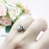 Oval Halo Split Shank Twisted Ring