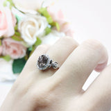 Oval Halo Split Shank Twisted Ring