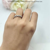 Half Eternity Twisted Infinity Diamond Band
