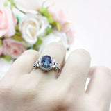 Oval Halo Split Shank Twisted Ring