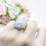 Oval Halo Split Shank Twisted Ring