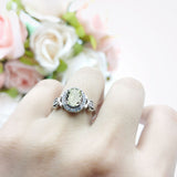 Oval Halo Split Shank Twisted Ring