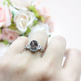 Oval Halo Split Shank Twisted Ring