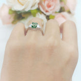Three Stone Emerald Cut Trellis Ring