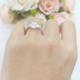 Three Stone Emerald Cut Trellis Ring