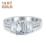 Three Stone Emerald Cut Gold Ring
